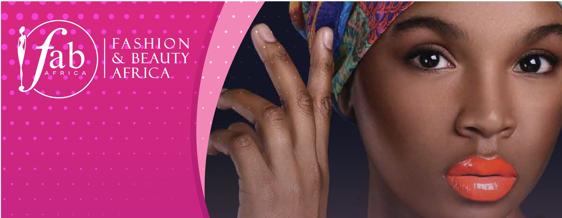 Model pulling back a pink curtain beside the FAB Africa logo